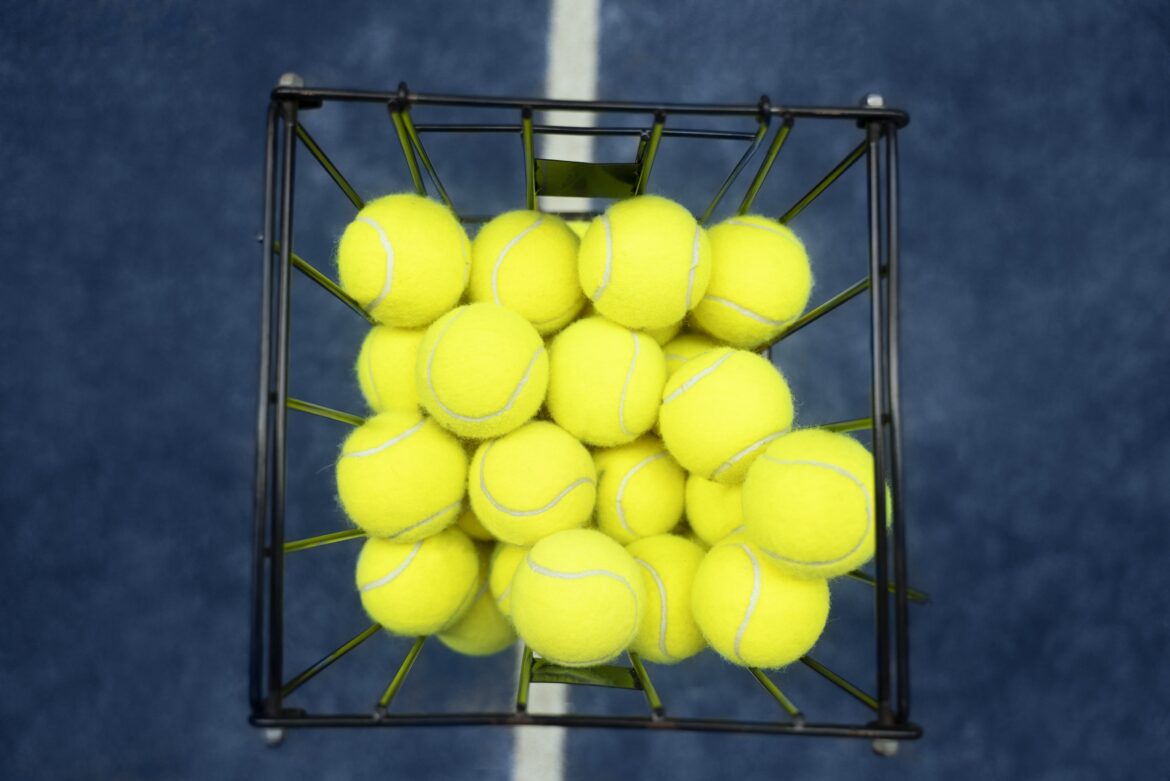 basket with tennis balls